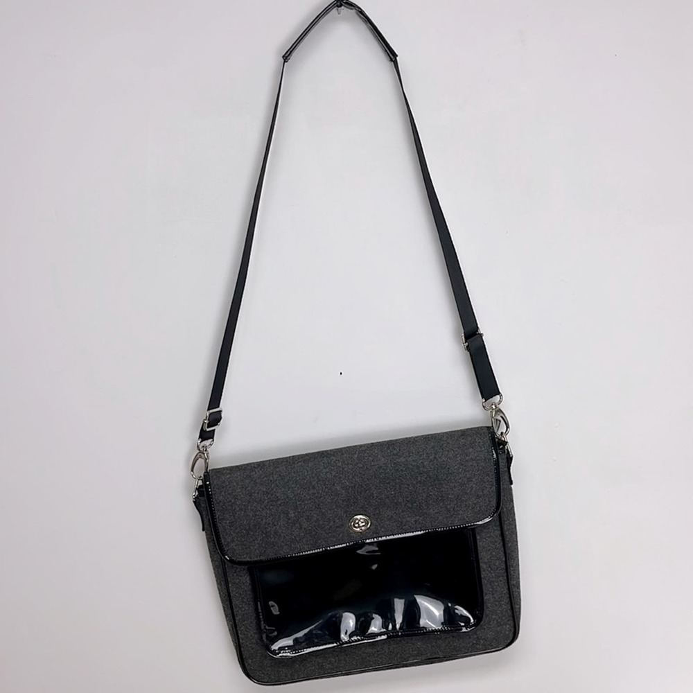 Gemline's attractive clean gray fabric woman's crossbody bag with many pockets